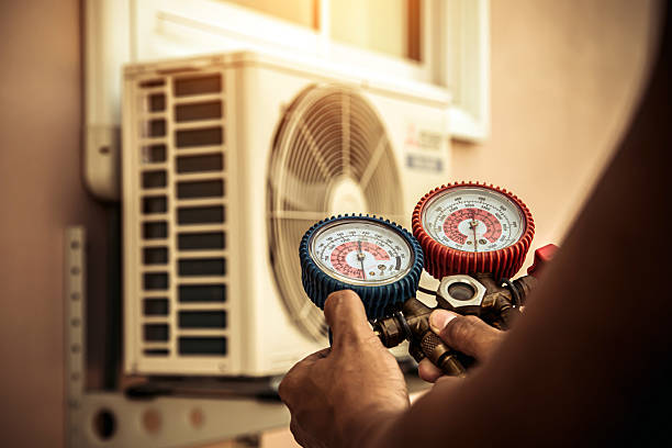 Professional Heat Pump Repair technician working in Columbus, KS